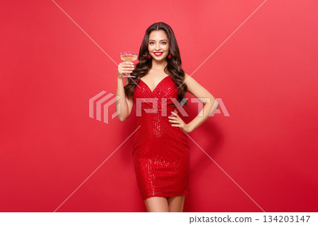 Beautiful woman with glass of champagne Beautiful woman with glass of champagne 134203147