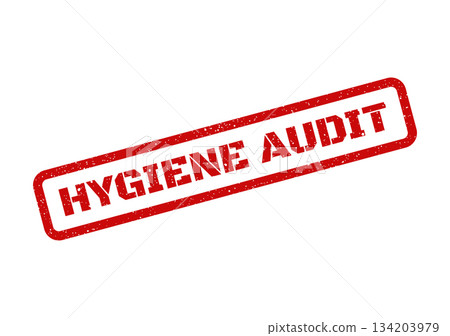 A distressed rubber stamp mark indicating a hygiene audit process is underway or has been performed 134203979