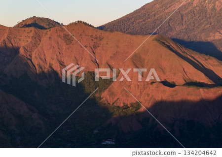 Dry Pergasingan Hills glowing warm morning light, Lombok. Dry Pergasingan Hills glowing warm morning light, Lombok. 134204642