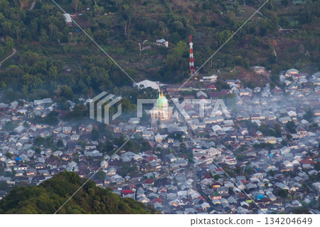 Lombok mosque stands tall over dense Sembalun village view. 134204649