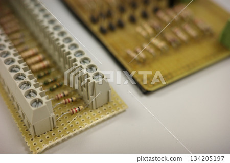 Electronic circuit board with resistors and terminal blocks 134205197