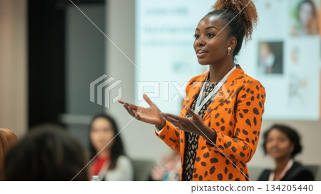 Engaging speaker presents ideas to an attentive audience during a professional development workshop Engaging speaker presents ideas to an attentive audience during a professional development workshop 134205440