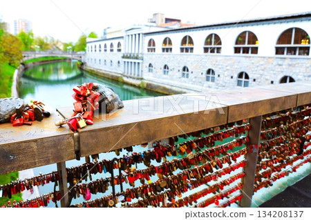 Padlocks plastered all over the Butcher's Bridge over the Ljubljanica River in Ljubljana Padlocks plastered all over the Butcher's Bridge over the Ljubljanica River in Ljubljana 134208137