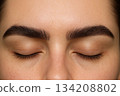 Young Woman Close-Up Eyes Closed 134208802