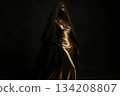 Dark-Skinned Woman in Golden Dress 134208807