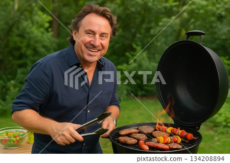 Man Grilling Outdoors Man Grilling Outdoors 134208894