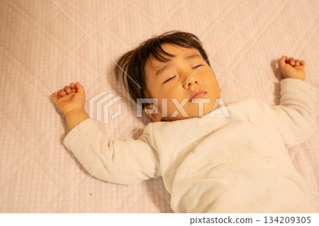A baby taking a nap 134209305