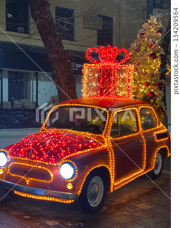 Festive Car Decorated With Christmas Lights Festive Car Decorated With Christmas Lights 134209564