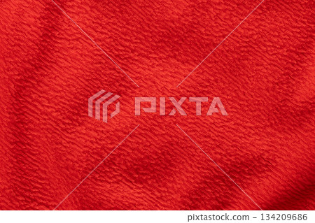 Bright red textured fabric background surface 134209686