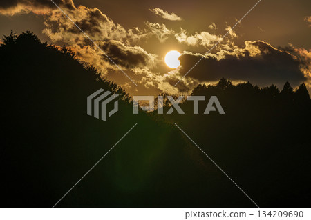 Nara Nunome Dam in early winter - Sunset sinking into the mountains across Lake Nunome① 134209690