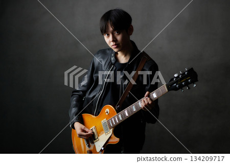 Young male musician live performance 134209717