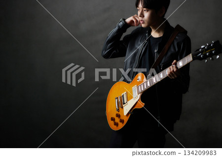 Young male musician live performance Young male musician live performance 134209983