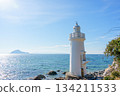 Irago Cape Lighthouse stands against the backdrop of blue sky and sea, with Kamishima Island offshore 134211533