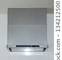 Before and after replacing a thin range hood 134212500