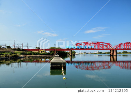Auspicious train running over the Kinokawa Bridge (Nankai Electric Railway) [Wakayama City, Wakayama Prefecture] 134212595