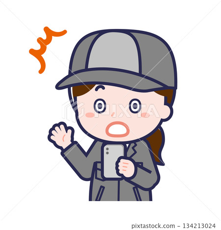 A female "factory worker" using a smartphone 134213024