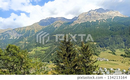 Chur, Switzerland - August 11 2022: View From Bernina Express from Tirano Italy Chur, Switzerland - August 11 2022: View From Bernina Express from Tirano Italy 134213164
