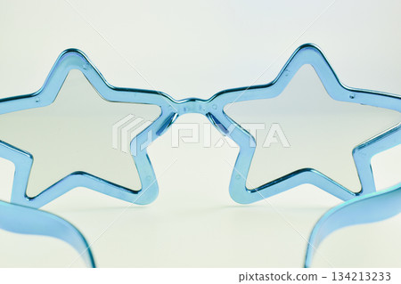blue star shape of glasses on old sepia background 134213233