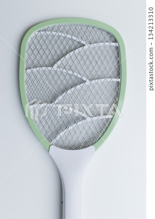 green mosquito swatter isolated on white background green mosquito swatter isolated on white background 134213310