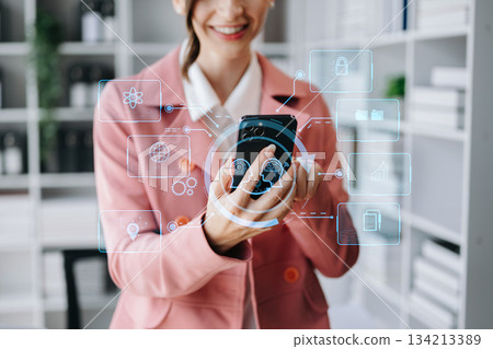 Woman using chatbot in computer and tablet smart intelligence Ai. AI generate. Woman using chatbot in computer and tablet smart intelligence Ai. AI generate. 134213389