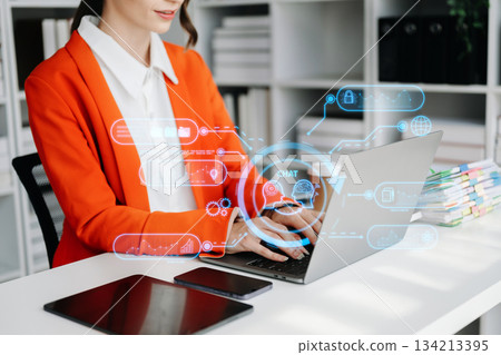 Woman using chatbot in computer and tablet smart intelligence Ai. AI generate. Woman using chatbot in computer and tablet smart intelligence Ai. AI generate. 134213395