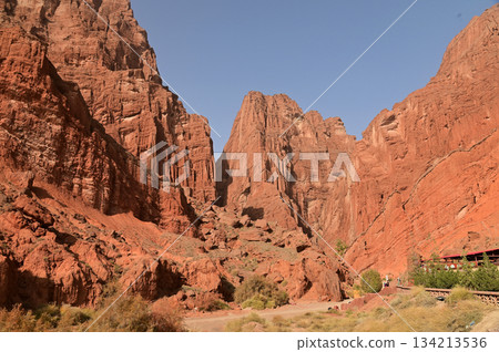 The Tianshan Grand Canyon, or Kesileya Grand Canyon, is a stunning natural feature in Xinjiang, China characterized by its distinctive red canyons formed by millions of years of wind and rain erosion. The Tianshan Grand Canyon, or Kesileya Grand Canyon, is a stunning natural feature in Xinjiang, China characterized by its distinctive red canyons formed by millions of years of wind and rain erosion. 134213536