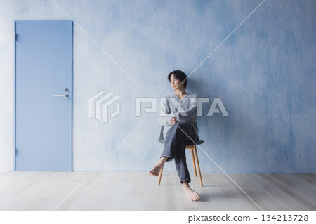 A man to relax in the room A man to relax in the room 134213728
