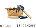 Small Woven Basket With Garden Tools Including Shovel, Trowel, And Rake 134214294