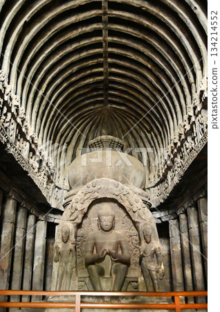 Buddha statue in Cave No.10 of the Buddhist temple at Ellora Caves. Elora a UNESCO World Heritage Site, is one of the world's largest collections of rock-cut temples and shrines. 134214552