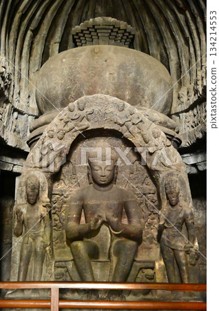 Buddha statue in Cave No.10 of the Buddhist temple at Ellora Caves. Elora a UNESCO World Heritage Site, is one of the world's largest collections of rock-cut temples and shrines. Buddha statue in Cave No.10 of the Buddhist temple at Ellora Caves. Elora a UNESCO World Heritage Site, is one of the world's largest collections of rock-cut temples and shrines. 134214553