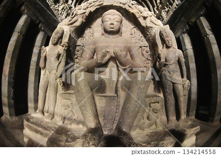 Buddha statue in Cave No.10 of the Buddhist temple at Ellora Caves. Elora a UNESCO World Heritage Site, is one of the world's largest collections of rock-cut temples and shrines. Buddha statue in Cave No.10 of the Buddhist temple at Ellora Caves. Elora a UNESCO World Heritage Site, is one of the world's largest collections of rock-cut temples and shrines. 134214558