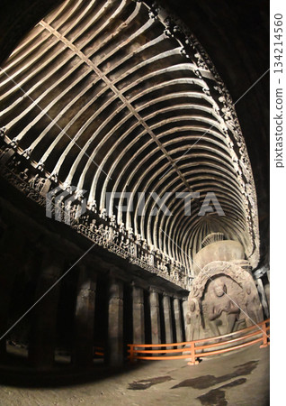 Buddha statue in Cave No.10 of the Buddhist temple at Ellora Caves. Elora a UNESCO World Heritage Site, is one of the world's largest collections of rock-cut temples and shrines. Buddha statue in Cave No.10 of the Buddhist temple at Ellora Caves. Elora a UNESCO World Heritage Site, is one of the world's largest collections of rock-cut temples and shrines. 134214560