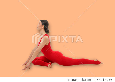 Yoga practice showing a person stretching in a studio Yoga practice showing a person stretching in a studio 134214756