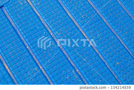 Blue ridged surface texture with square grid and diagonal grooves 134214839