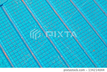 Blue ridged surface texture with square grid and diagonal grooves Blue ridged surface texture with square grid and diagonal grooves 134214844