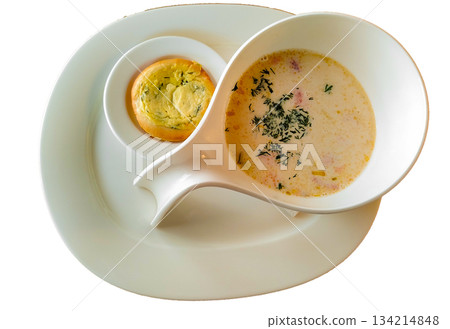 Norwegian fish soup creamy salmon chowder in white bowl isolated horizontal Norwegian fish soup creamy salmon chowder in white bowl isolated horizontal 134214848