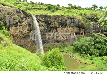 Waterfalls flowing through the valley near the Ellora, a UNESCO World Heritage Site, is one of the world's largest collections of rock-cut temples and shrines, containing Hindu, Buddhist and Jain art. Waterfalls flowing through the valley near the Ellora, a UNESCO World Heritage Site, is one of the world's largest collections of rock-cut temples and shrines, containing Hindu, Buddhist and Jain art. 134215425