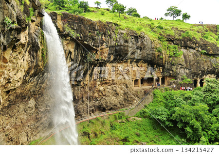 Waterfalls flowing through the valley near the Ellora, a UNESCO World Heritage Site, is one of the world's largest collections of rock-cut temples and shrines, containing Hindu, Buddhist and Jain art. Waterfalls flowing through the valley near the Ellora, a UNESCO World Heritage Site, is one of the world's largest collections of rock-cut temples and shrines, containing Hindu, Buddhist and Jain art. 134215427