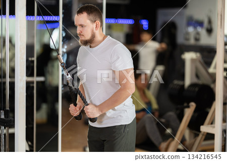 Man training his hands in a crossover 134216545