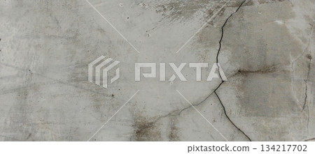 Weathered concrete wall with cracks. Weathered concrete wall with cracks. 134217702