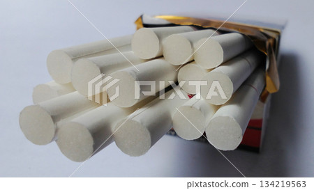 Close-up image of cigarettes in an open pack. Close-up image of cigarettes in an open pack. 134219563