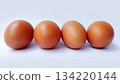 Fresh Brown Eggs on White Background 134220144