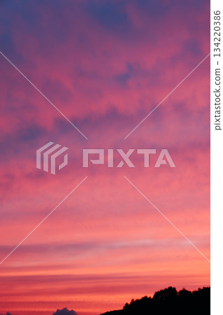 Bright red sunset and blue sky Bright red sunset and blue sky 134220386