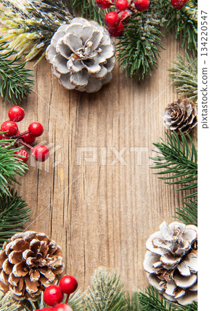 Christmas winter holiday frame on rustic wood background Christmas winter holiday frame on rustic wood background 134220547