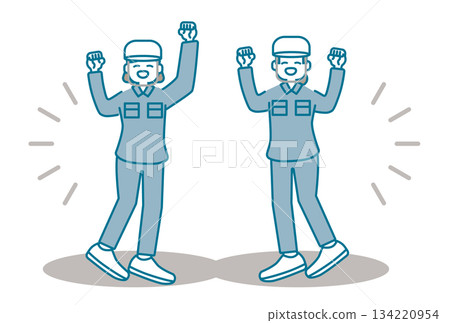 Women in work clothes wearing helmets enthusiastically pumping their fists Women in work clothes wearing helmets enthusiastically pumping their fists 134220954