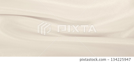 Smooth elegant golden silk or satin luxury cloth texture as wedding background. Luxurious background design. In Sepia toned. Retro style 134225947
