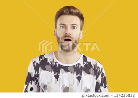 Portrait of handsome young man with shocked facial expression Portrait of handsome young man with shocked facial expression 134226838