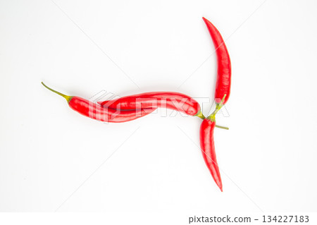 Red hot chili peppers on a white background. Vitamin vegetable food Red hot chili peppers on a white background. Vitamin vegetable food 134227183