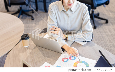 Young women having a meeting in the office Young women having a meeting in the office 134227996