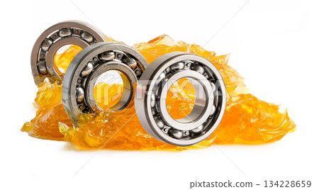 Ball bearing stainless with grease lithium machinery lubrication for automotive and industrial isolated on white background. Ball bearing stainless with grease lithium machinery lubrication for automotive and industrial isolated on white background. 134228659